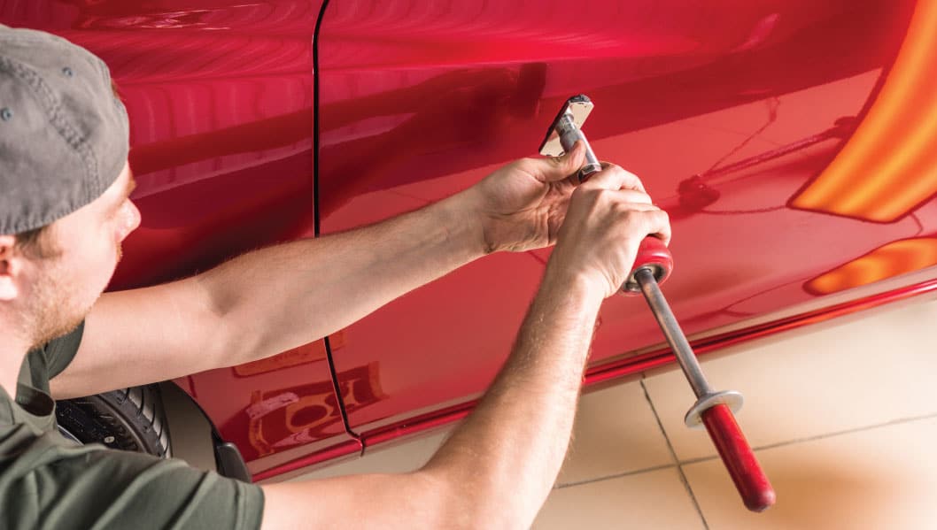 Houston traffic bumper repair collision damage Race Track Auto Center professional services
