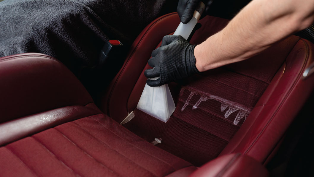 Professional leather cleaning Houston TX leather conditioning stain removal Race Track Auto Center