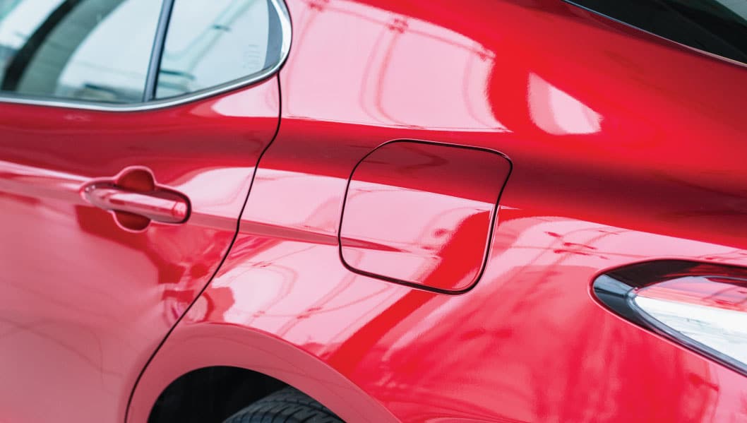 Professional dent pulling Houston TX paintless dent repair hail damage Race Track Auto Center