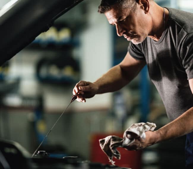 Oil change Houston TX professional quick lube synthetic oil Race Track Auto Center Westchase