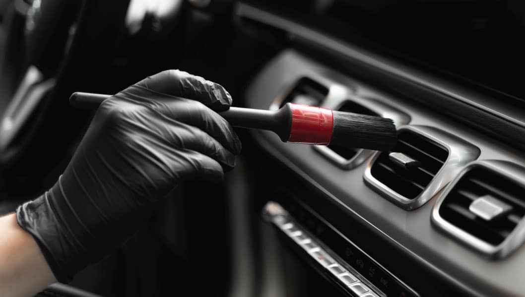 Steam cleaning equipment interior detailing Houston TX Race Track Auto Center professional deep cleaning